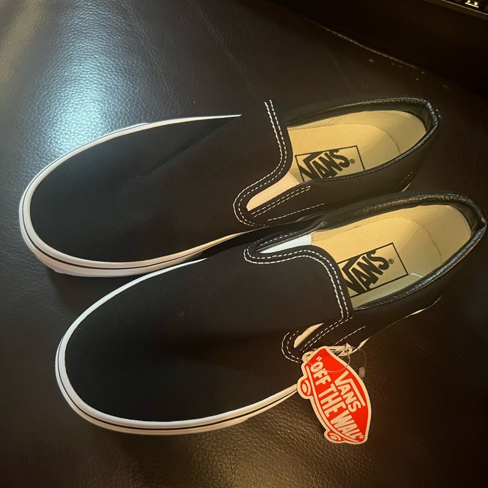 Slip on Black Vans, only tried on. 7.0 Men’s, 8.5 women’s Eur 39